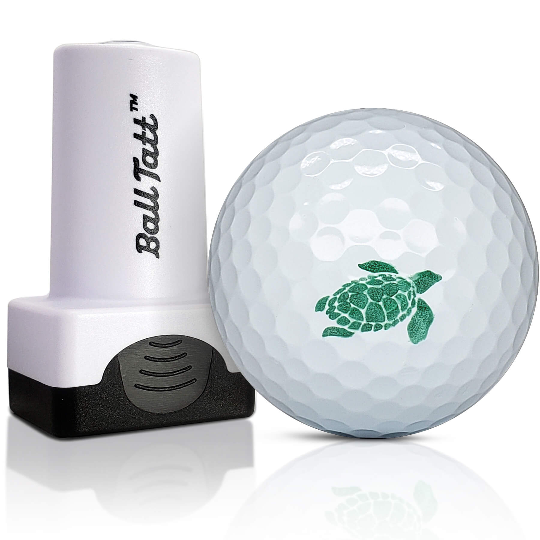 Green Turtle golf ball stamp marking tool for clear ball identification.